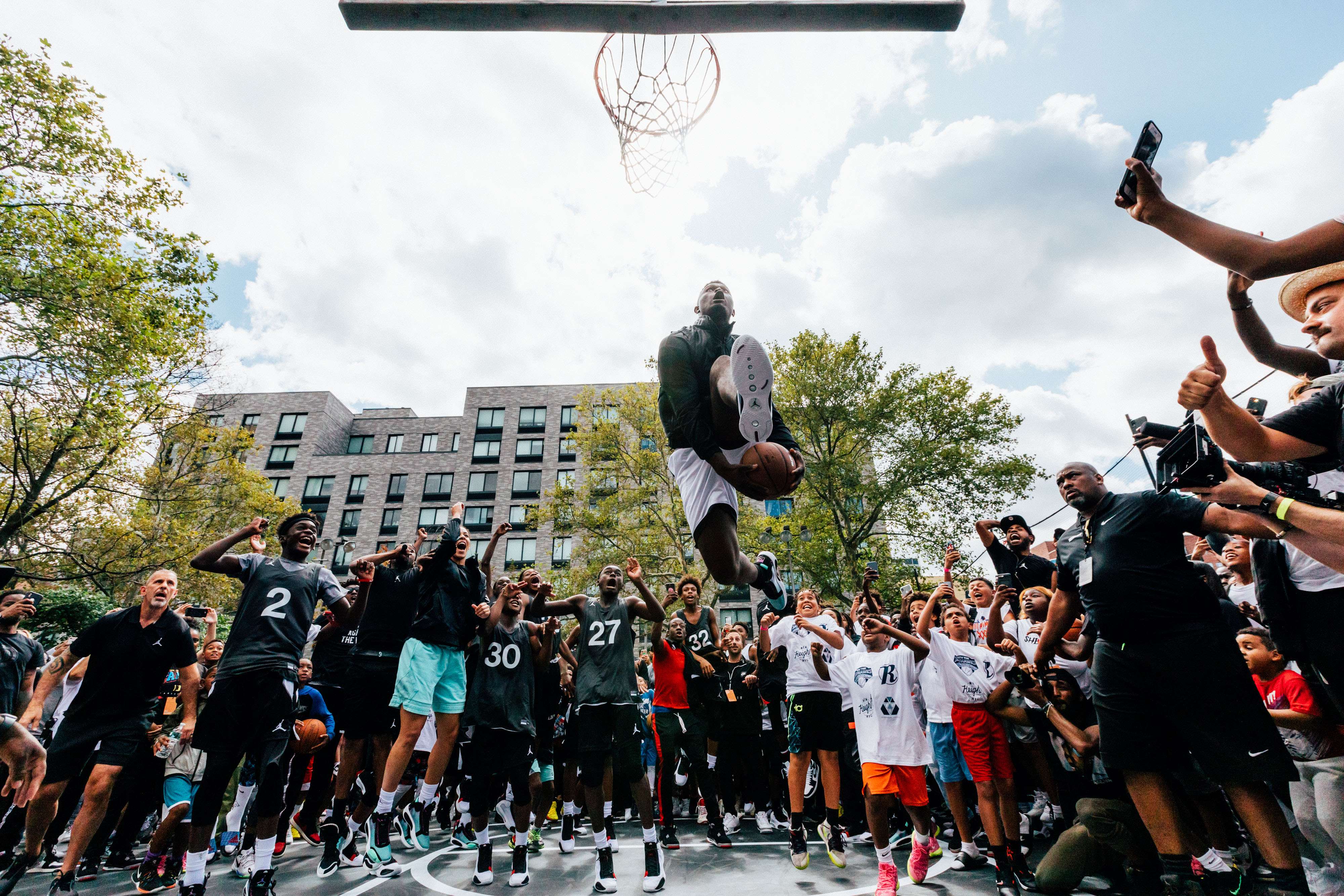 Zion Williamson dunks at the Air Jordan XXXIV launch event in Harlem